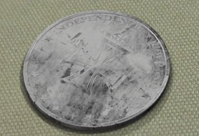 Загадка монеты со свастикой и датой 2039 год 